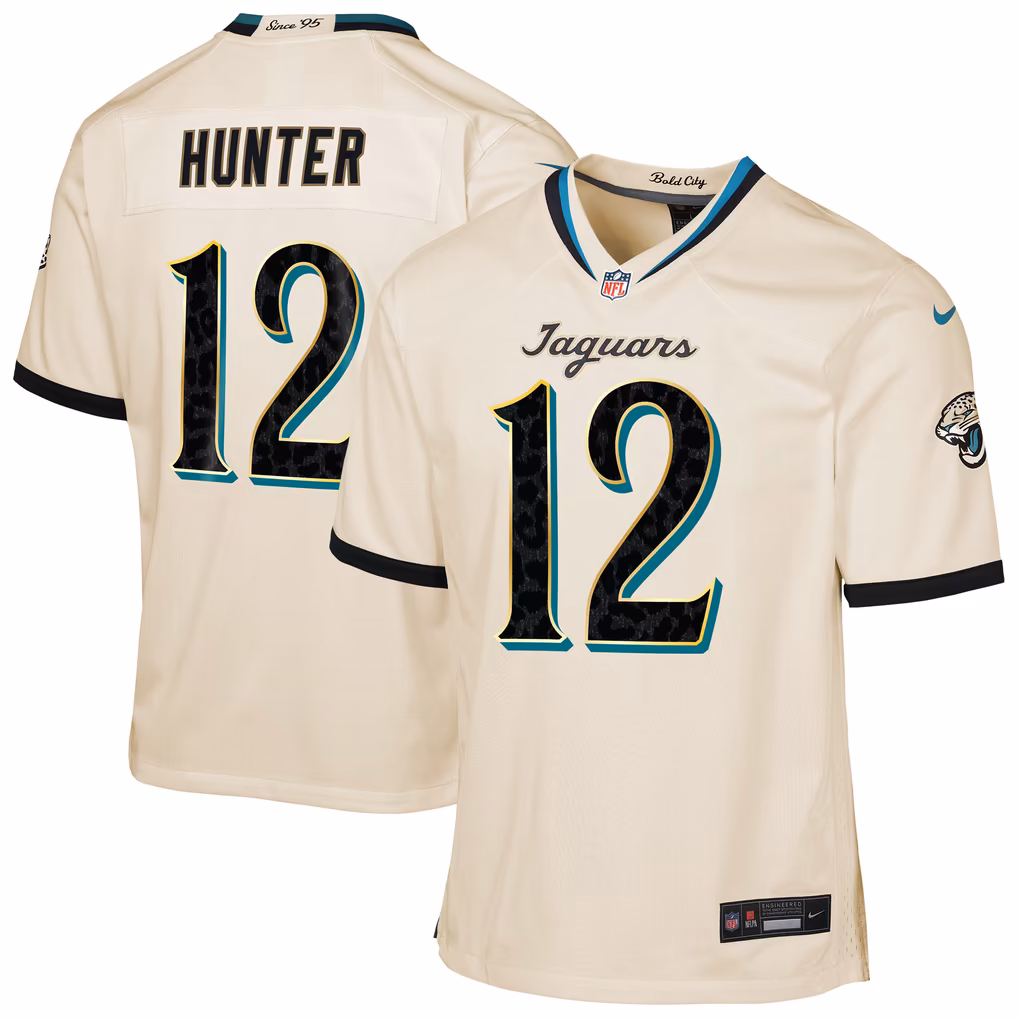 Youth Jacksonville Jaguars Travis Hunter Nike Natural 2026 Rivalries Collection Game Jersey - Ujersey