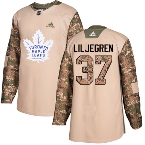 Men's Adidas Toronto Maple Leafs #37 Timothy Liljegren Authentic Camo Veterans Day Practice NHL Jersey - Ujersey