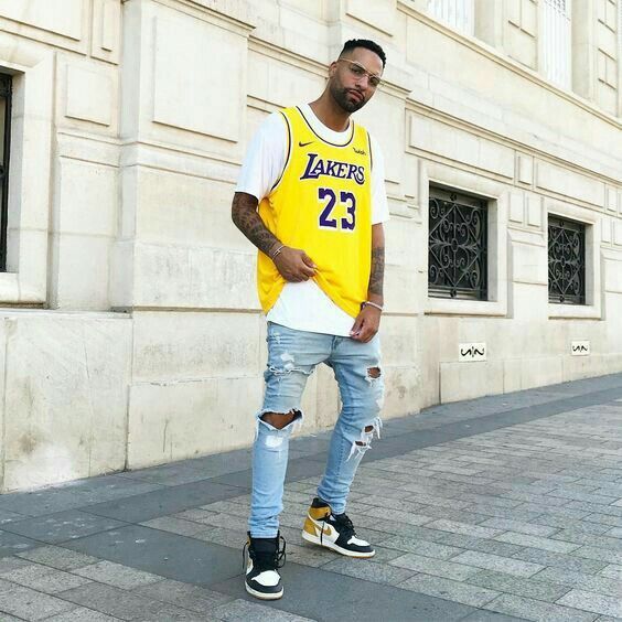 Man wearing a Los Angeles Lakers jersey